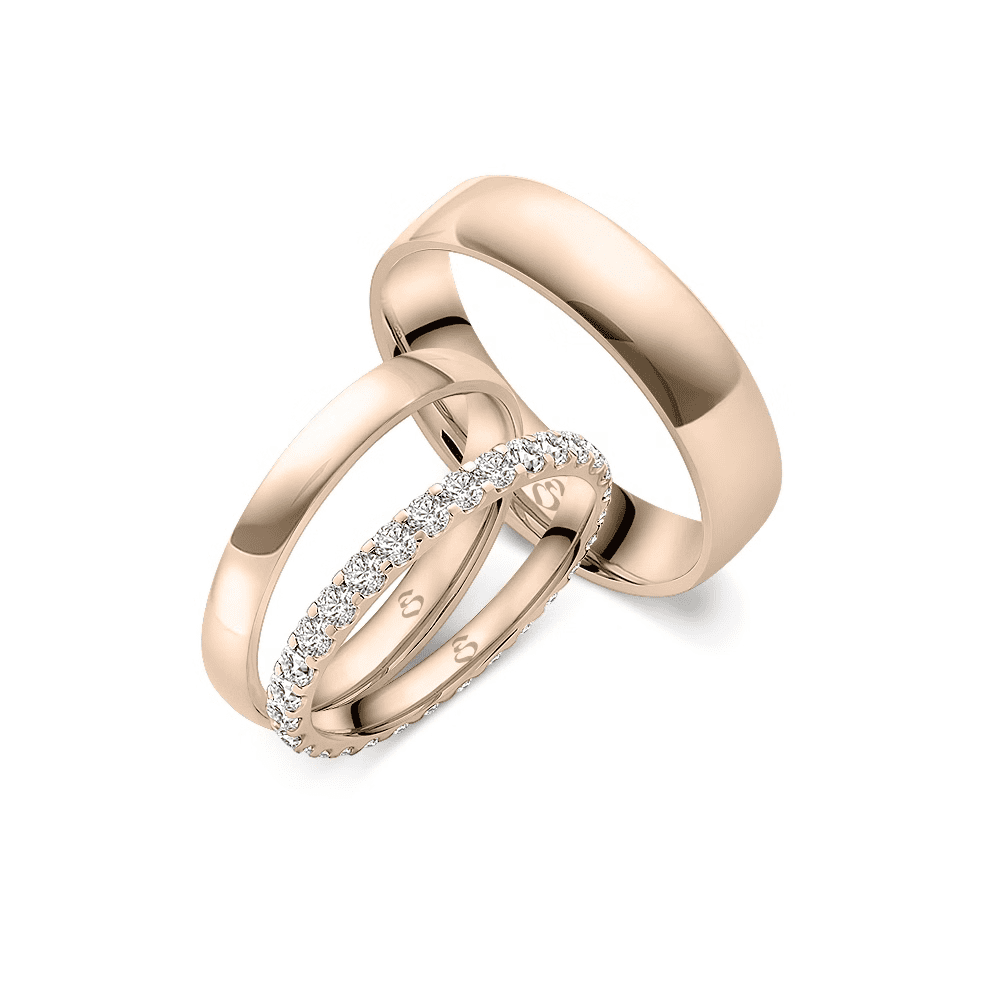 Zwei roségoldene Ringe ohne Gesicht, einer mit Diamantreihe am Rand