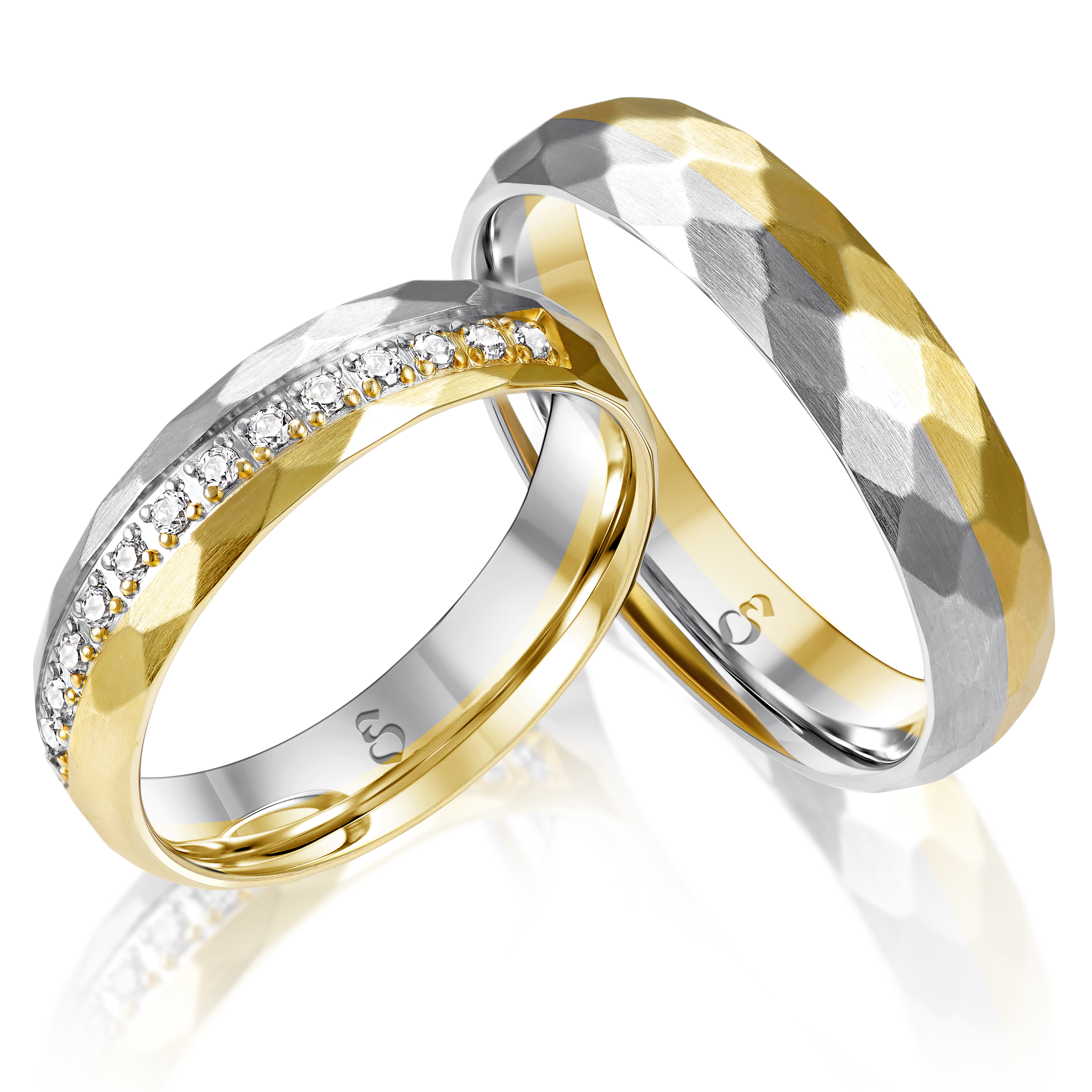 Zwei bicolor Ringe in Gold und Silber mit Facettenschliff und Steinen